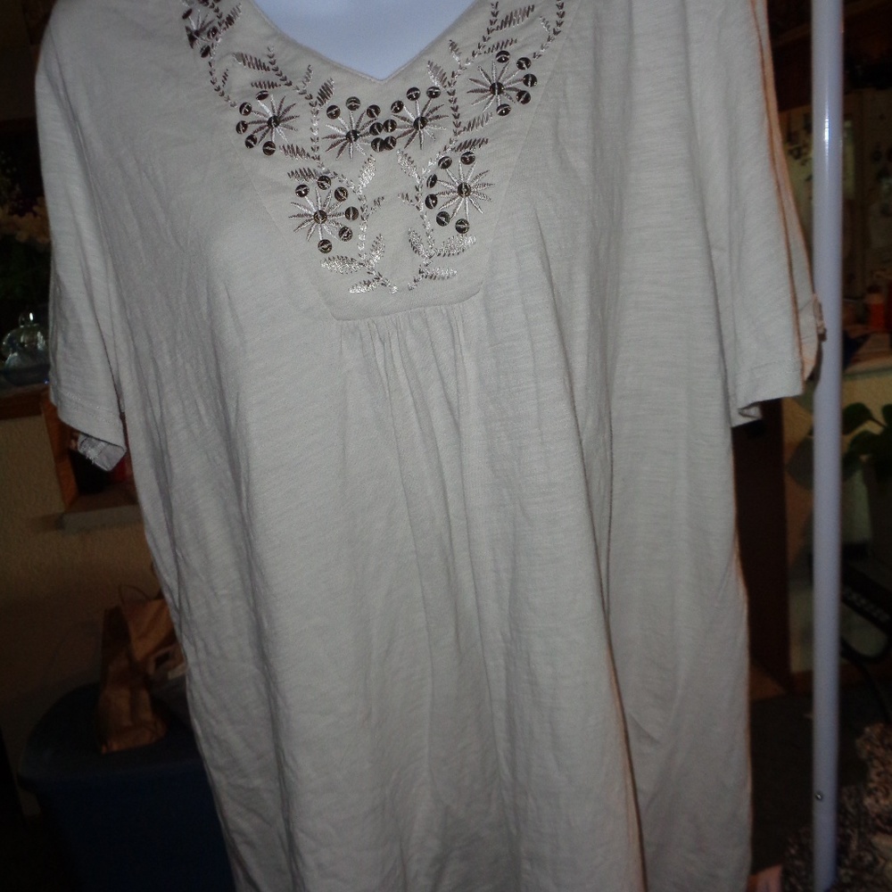 This is a CjBanks top for women used